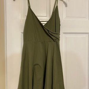 Olive green dress with slit at the top